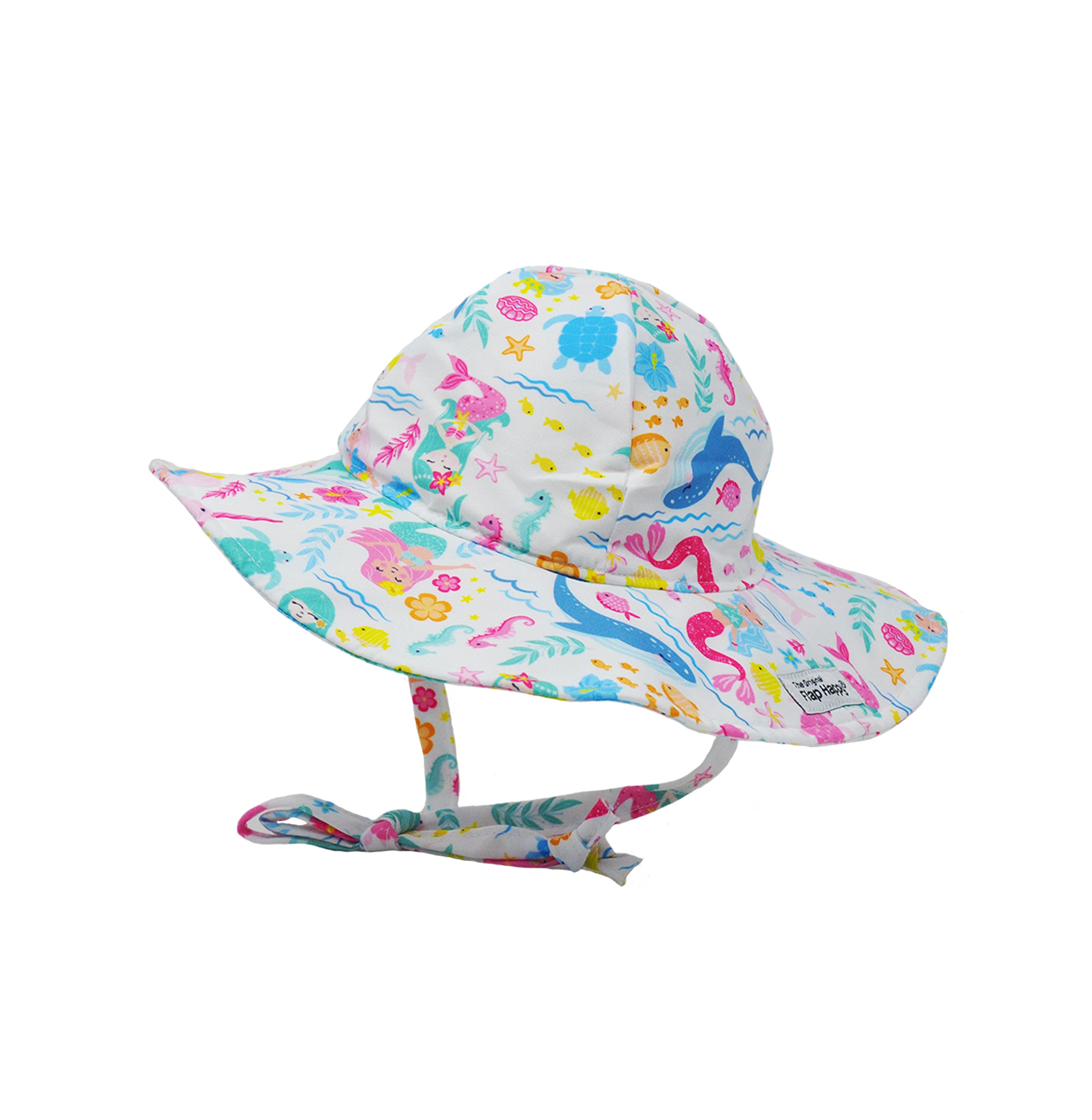 Flap Happy Kids UPF 50+ Floppy Sun Hat in Mermaid Friends. The print in a white background, with blue whales, turtles and water waves .