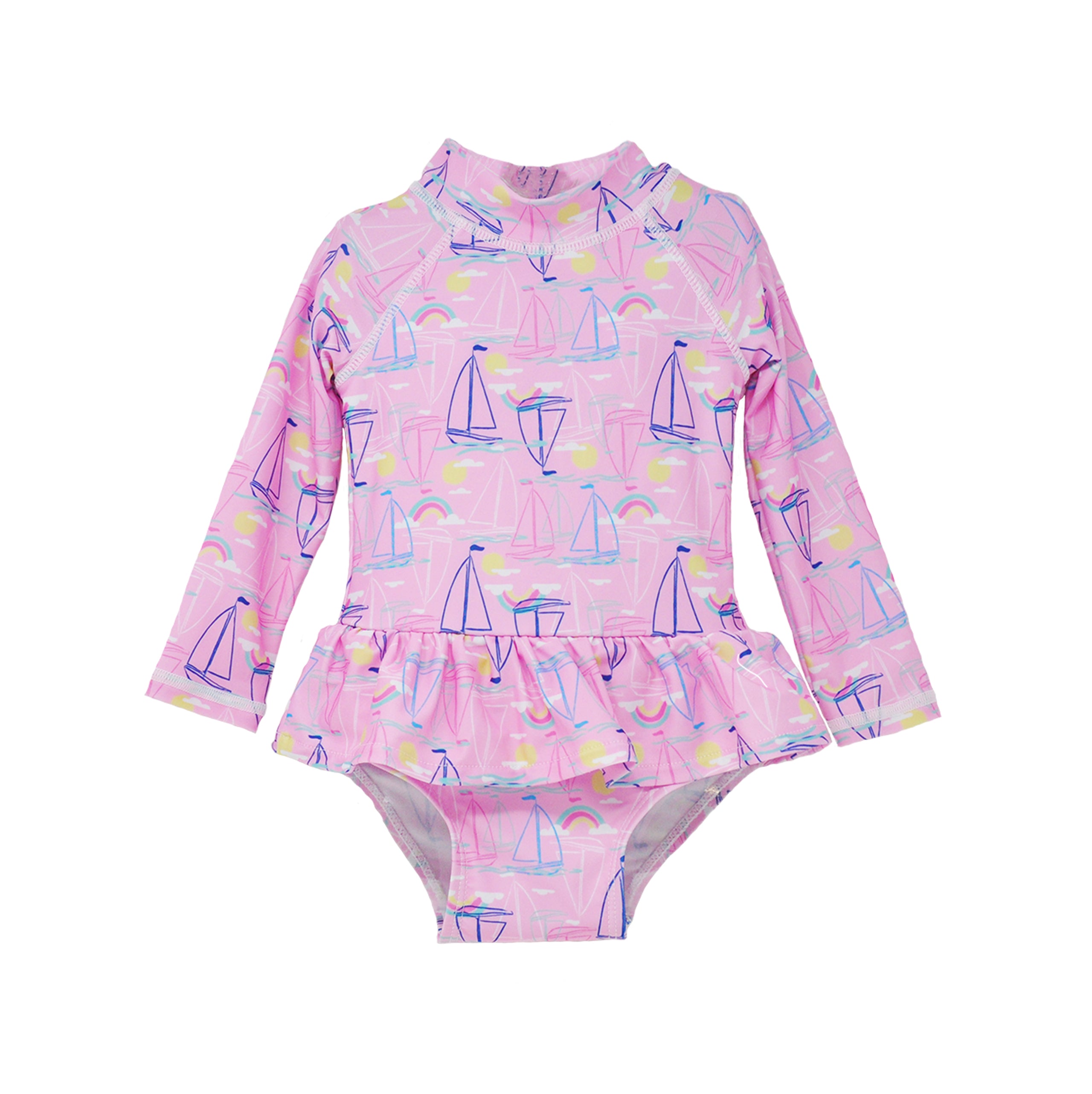 Flap Happy Infants UPF 50+ Ruffle Rash Guard swimsuit in Sail Away. The print has Blue and Pink colored sail boats. With bright yellow sun and small colorful rainbows.