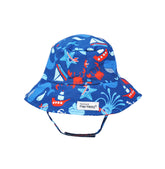  Flap Happy Kids UPF 50+ Bucket Hat Sun Hat in Nautical Fun for sun protection. The Print is Navy with red crabs and light blue sailboats, octopus and pirates starfishes.
