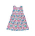Flap Happy Kids UPF 50+ sleeveless dress with pockets Island Doodles for sun protection. The Print is Pink background with color Palm Trees, sail boats and rainbows.