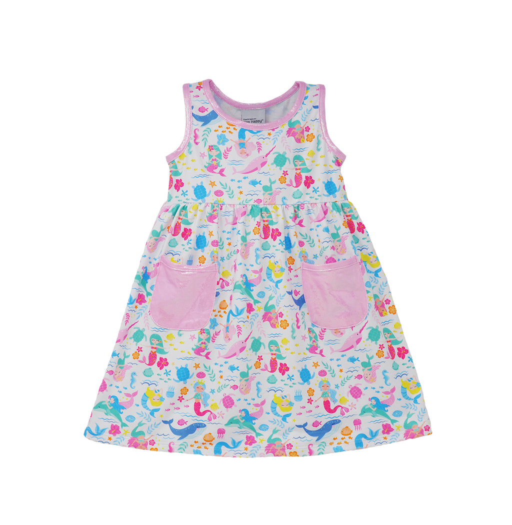 Flap Happy Kids UPF 50+ sleeveless dress with pockets Mermaid Friends for sun protection. The Print is White background with colorful mermaids, and surrounded by whales, fish and turtles. 