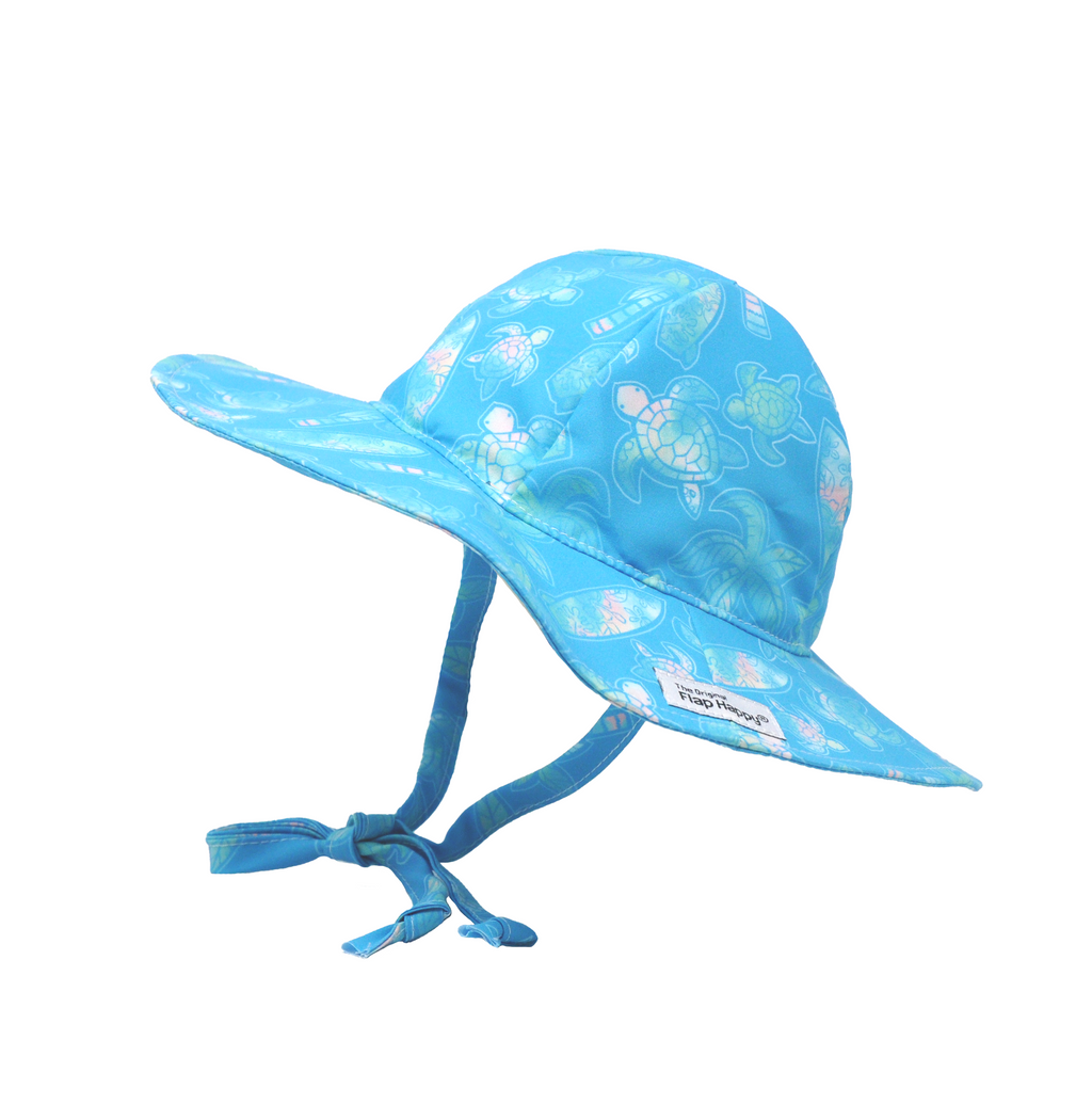 Flap Happy Kids UPF 50+ Floppy Sun Hat in Coco Beach Turtles for sun protection. The Print is Turquoise with water color turtles. surfboards and palm trees. 
