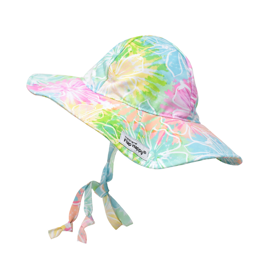 UPF 50+ Floppy Hat - Hibiscus Blooms. Multicolored watercolor hat with white linework hibiscus flowers. Ties around neck.