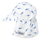 A white sun hat with a wide brim and a protective neck flap, featuring an all-over mini blue shark print and a small brand label that reads 'The Original Flap Happy'.