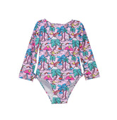 Flap Happy Kids UPF 50 Long sleeve  Rash Guard swimsuit Island Doddles for sun protection. The Print is Pink background with colorful Sail boats, palms trees and rainbows,