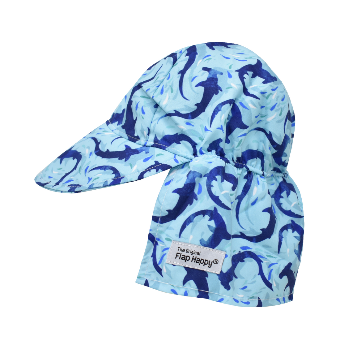 UPF 50+ Original Flap Hat - Swirly Sharks. Light blue hat with navy blue watercolor hammerhead sharks, and blue and white fish.