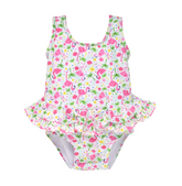 UPF 50+ Stella Infant Ruffle Swimsuit - Flamingo Party.  White swimsuit with light and dark pink flamingos, green palm trees, pink and yellow hibiscus flowers, and multicolor polka dots.