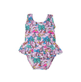 Flap Happy Kids UPF 50+ Infant Ruffle swimsuit in Island Doodles for sun protection. The Print is Pink with colorful palms, rainbow and sail boats.