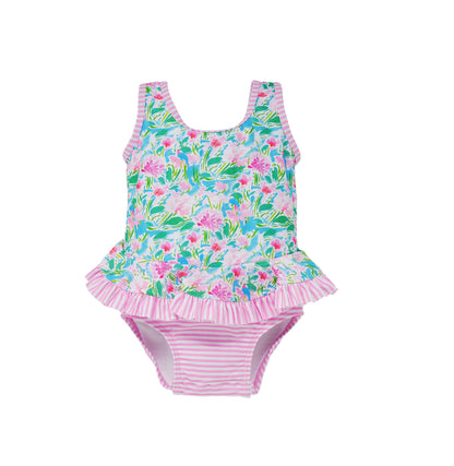 Flap Happy Kids UPF 50+ Infant Ruffle swimsuit in Lotus &amp; Lilies for sun protection. The Print has green Lotus and Pink Lilies. it also has sweet pink stripes.