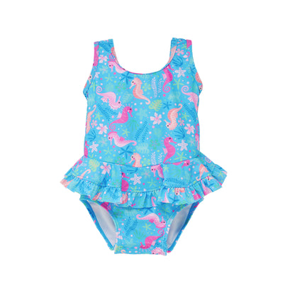 Flap Happy Kids UPF 50+ Infant Ruffle swimsuit in Seahorse Garden for sun protection. The Print is Blue with Pink and Orange seahorses surrounded with small leaves and flowers.