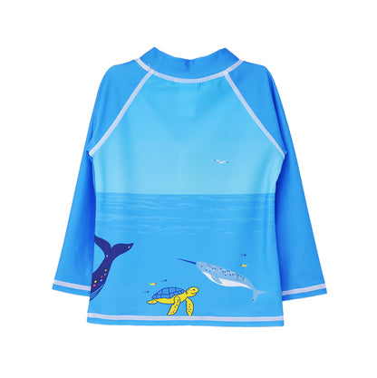 Flap Happy Kids UPF 50+ Rash Guard Swim Top  in Ocean Fiesta for sun protection. The Print is a back side of the ocean view with a whale, turtle and a dolphin. 