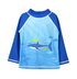 UPF 50+ Graphic Rash Guard Swim Top - Undersea Paradise. Light blue rash guard with multicolored blue and green shark and fish graphics on front and back. Dark blue sleeves and neck.