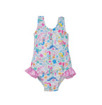 Flap Happy Kids UPF 50+ Infant hip Ruffle swimsuit in Mermaid Friends  for sun protection. The Print is white background with colorful Mermaids and whales.