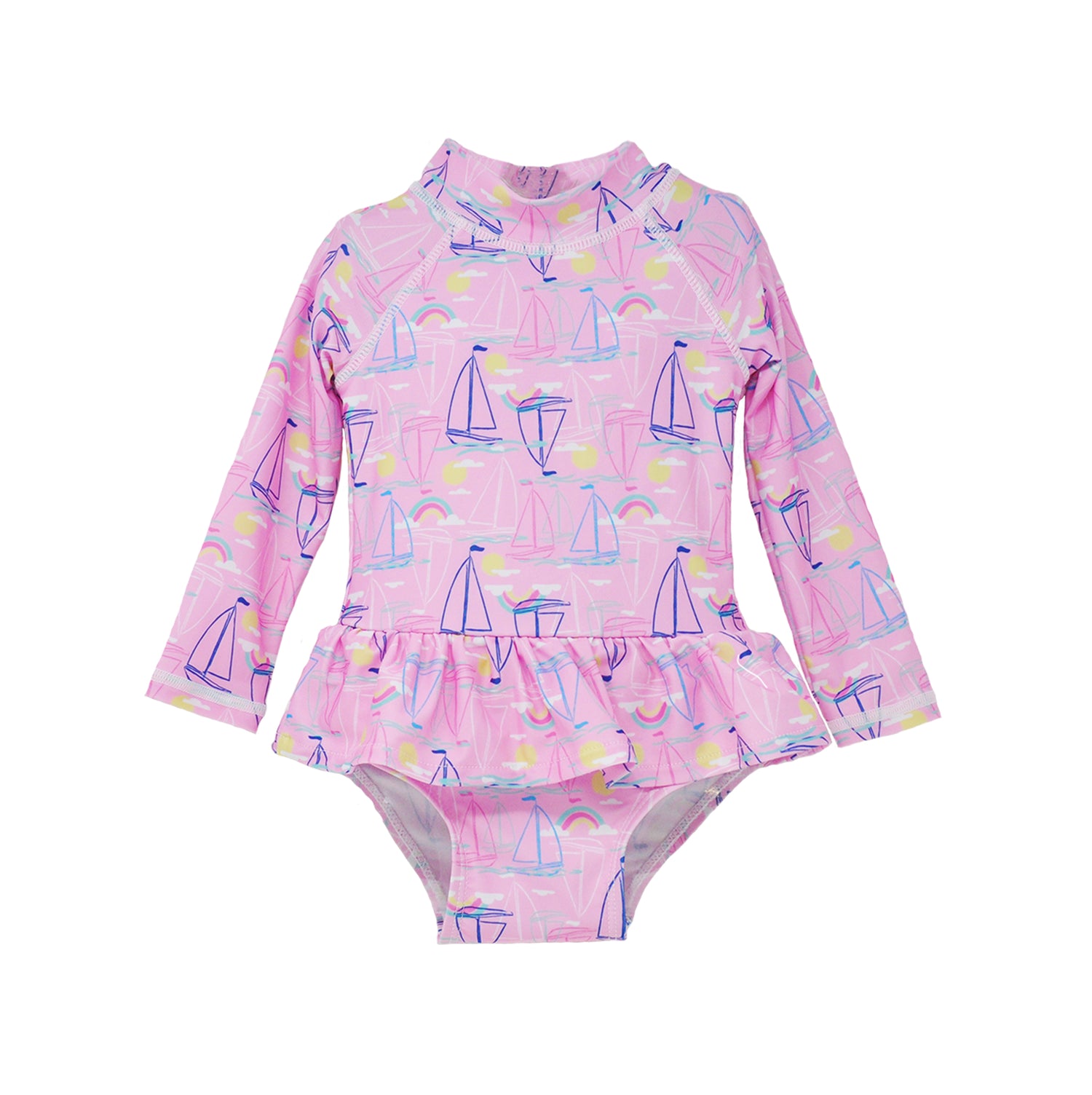  Flap Happy Infants UPF 50+ Ruffle Rash Guard swimsuit in Sail Away. The print has Blue and Pink colored  sail boats. With bright yellow sun and  small colorful rainbows.  