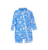 Flap Happy Kids UPF 50+ Shorties Surf Swimsuit in Seaside Palms for sun protection. The print has white icons of palm trees, water waves and starfish on a blue background.