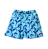 UPF 50+ Wesley Swim Trunks with Mesh Liner - Swirly Sharks. Light blue swim trunks with navy blue watercolor hammerhead sharks, and blue and white fish. Navy drawstring.